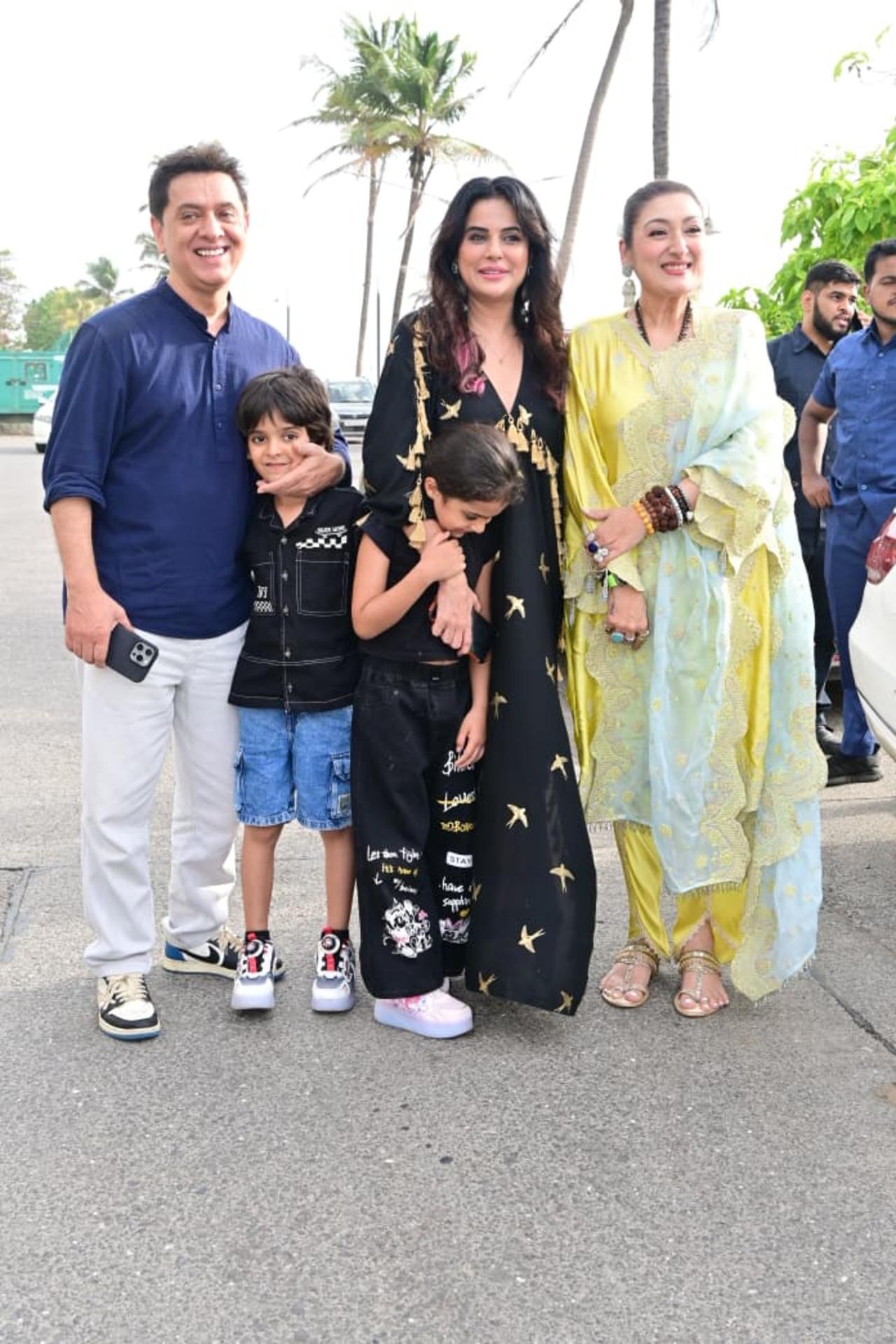 Bigg Boss 18 fame Arfeen Khan and Sara Arfeen Khan were seen posing with Sunita Ahuja and their kids at a charity event hosted by them.